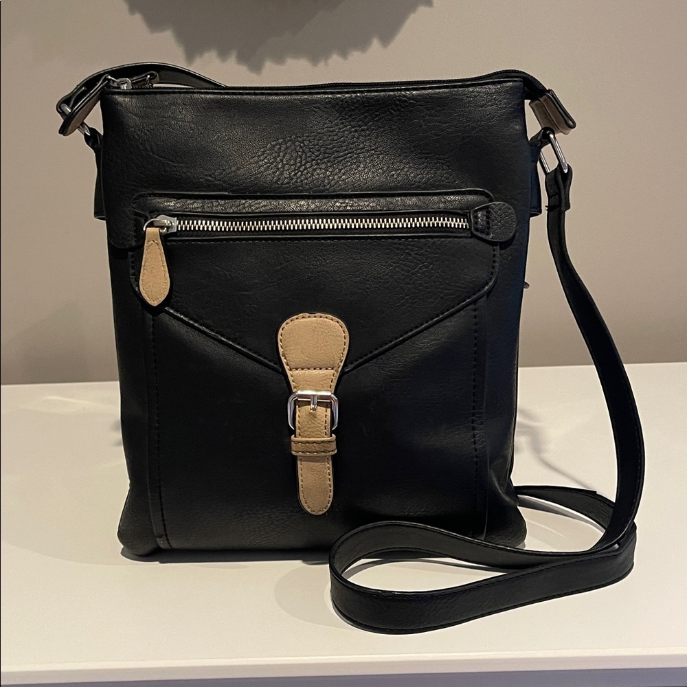 LAST CHANCE on this Charming Charlie Black and Tan Crossbody